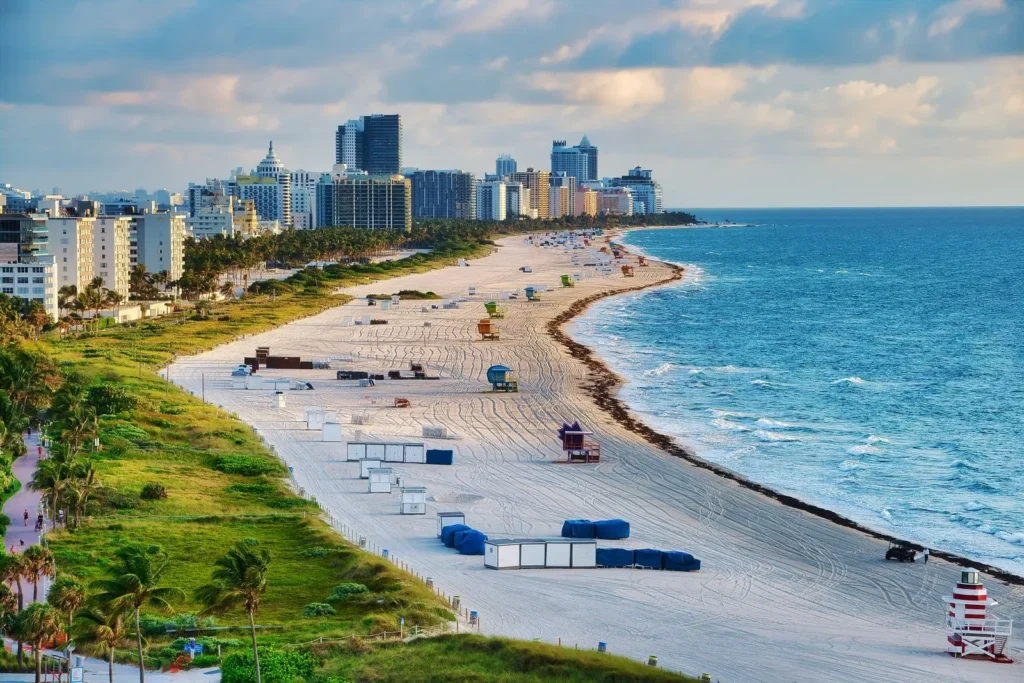 Aerial view of city buildings beside the ocean